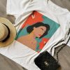 Woman with blue background and peach color flowers t shirt